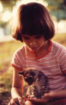 Young girl with kitten.